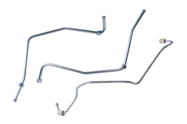 New metal high-pressure fuel tube of the car on an isolated white background. New metal high-pressure fuel tube of the car on an isolated white background.